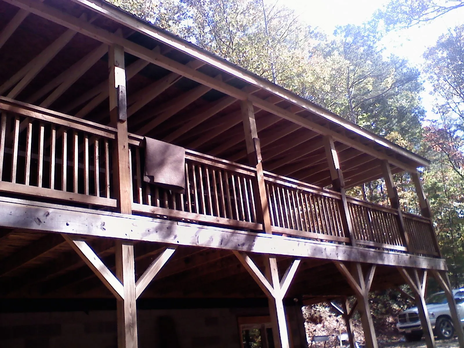 Timber framing under a new elevated porch and deck — Roof Leak Repair in Hollis Center by Roofing Brothers